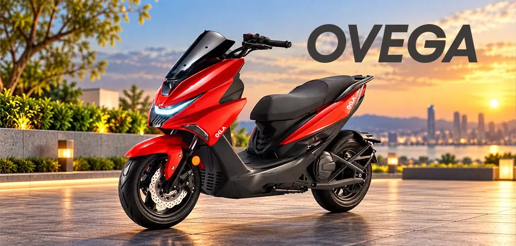 Red and black OKLA Ovega sporty electric scooter with LED headlight and tinted visor, parked at sunset
